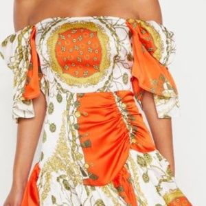 Orange Dress with Gold Chain Link Design